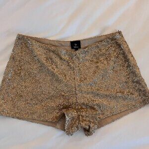Gold Sparkling (sequin) Hot Shorts! 
Size: Large (runs big)